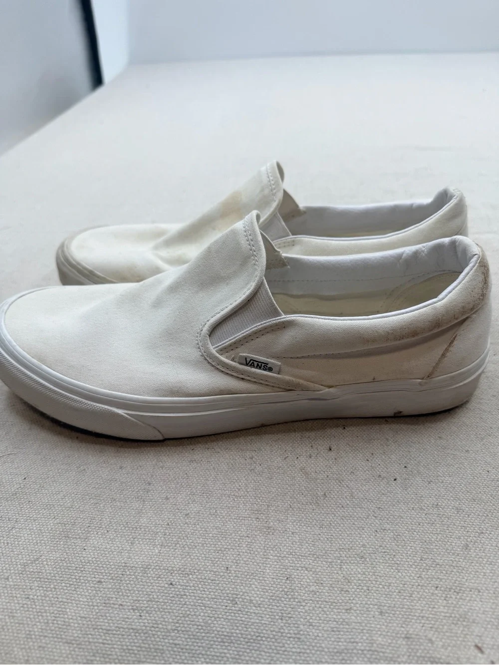 Vans  White Slip-On Sneakers